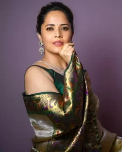 Anasuya Bharadwaj as Dakshayani "Daksha", Mangalam Srinu's wife